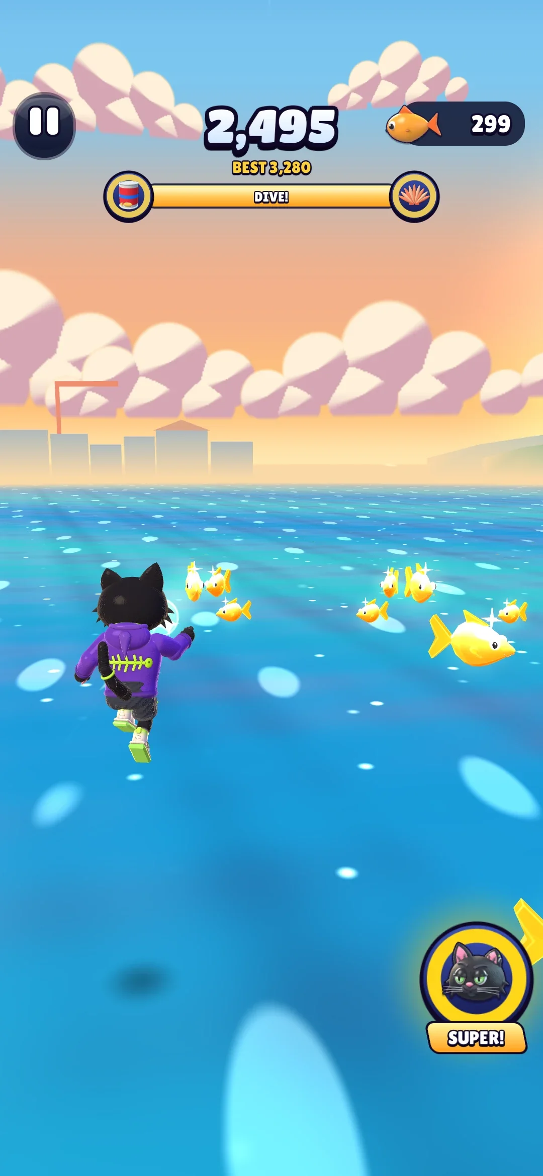 Jinx leaping off the end of the pier toward the sea, with fish arcing ahead of him