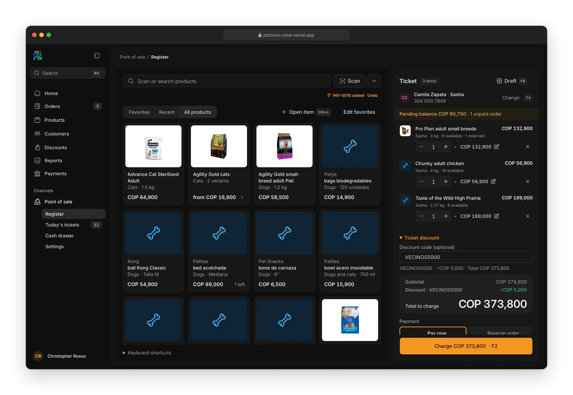 Petzone register in the dark theme with a three-item ticket for a customer and their pet, a discount code applied and the total to charge