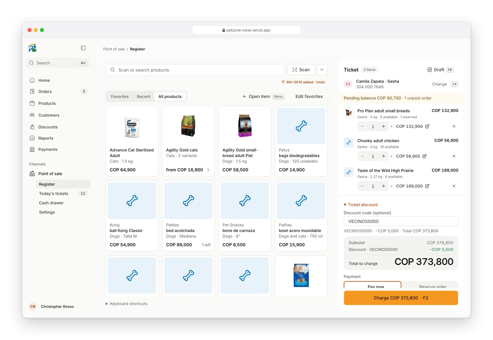 Petzone register: product tiles with their prices to scan or search, and a three-item ticket for a customer and their pet, with a pending balance flagged, a discount code applied and the total to charge