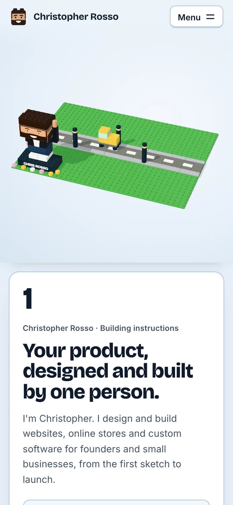Step 1 of the home page on a phone: the brick town above, the step's card below